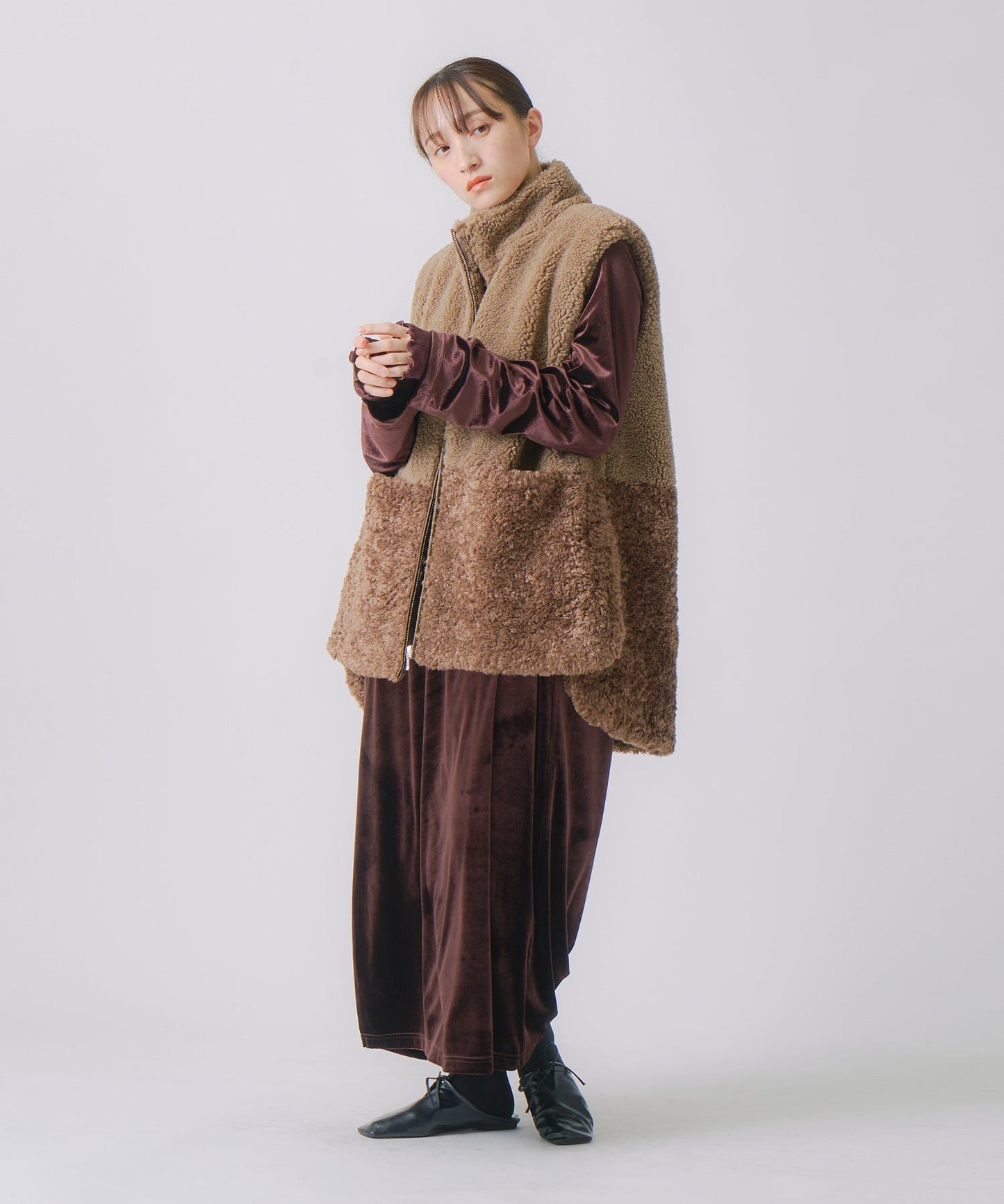 eco fur combination vest / WHT25FJK4045