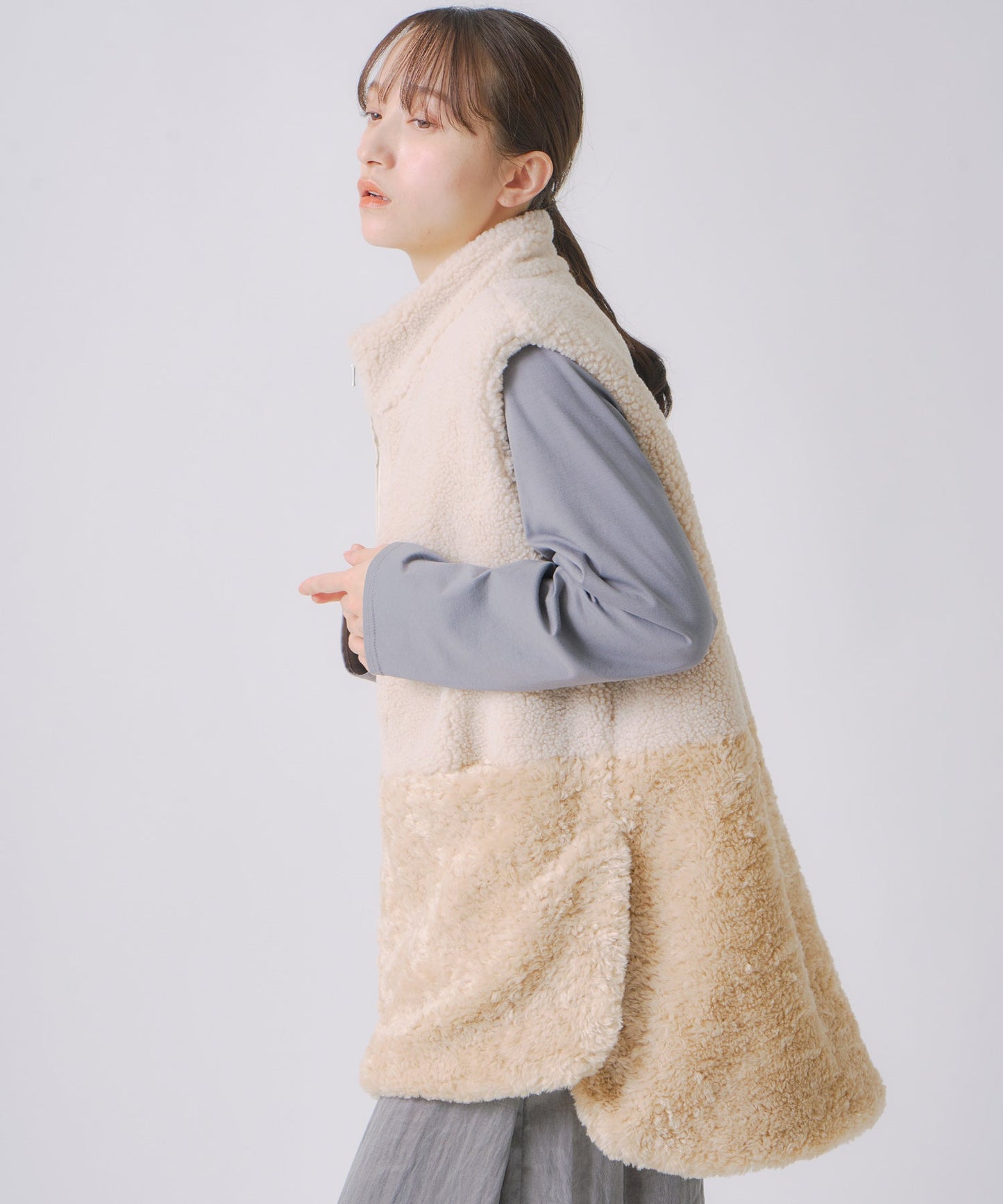 eco fur combination vest / WHT25FJK4045