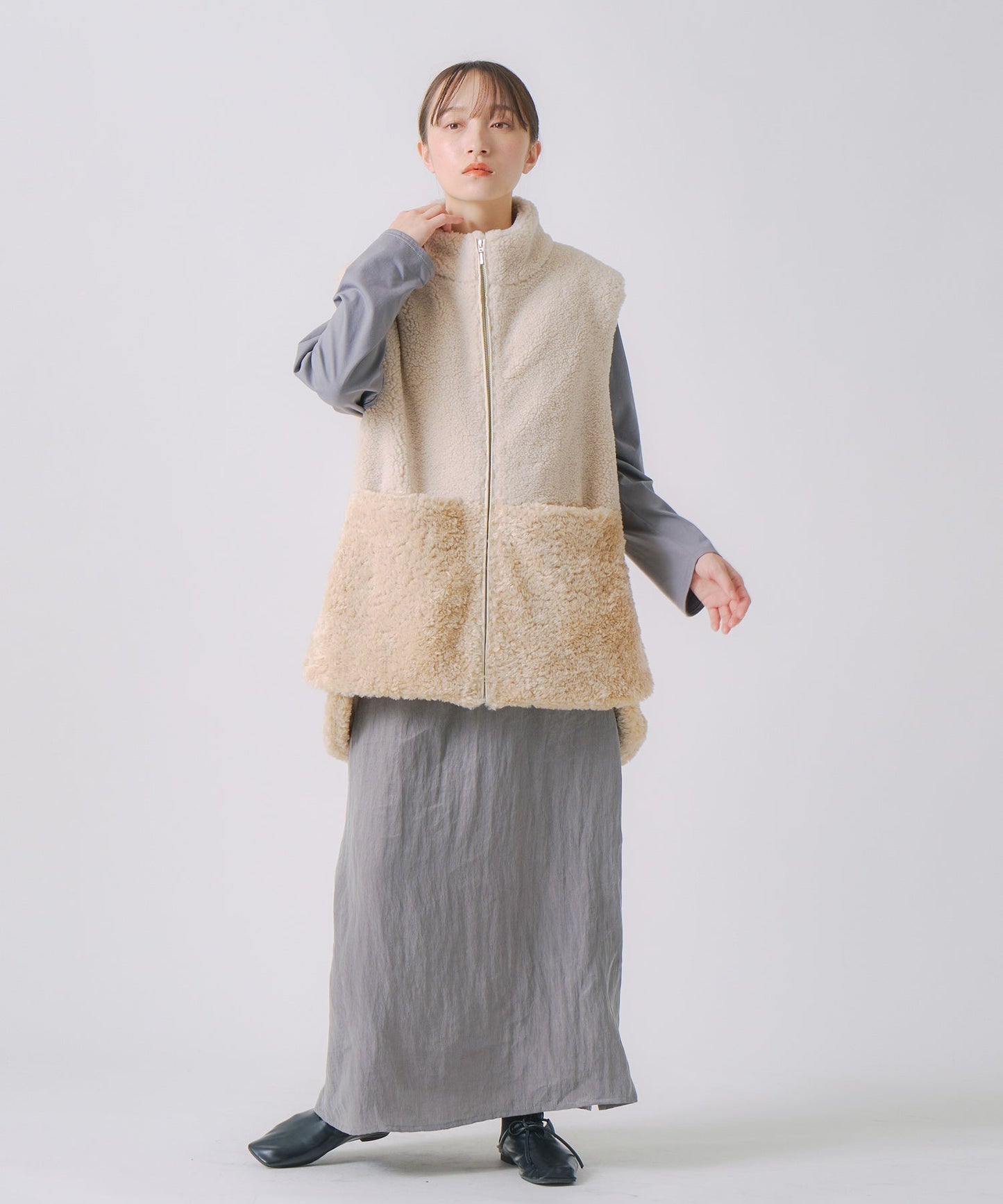 eco fur combination vest / WHT25FJK4045