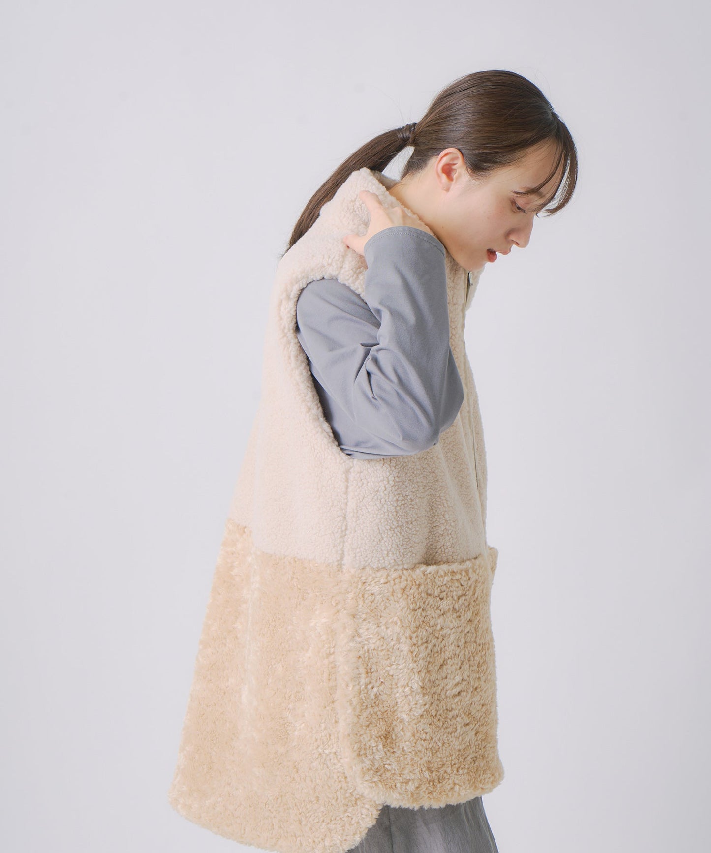eco fur combination vest / WHT25FJK4045
