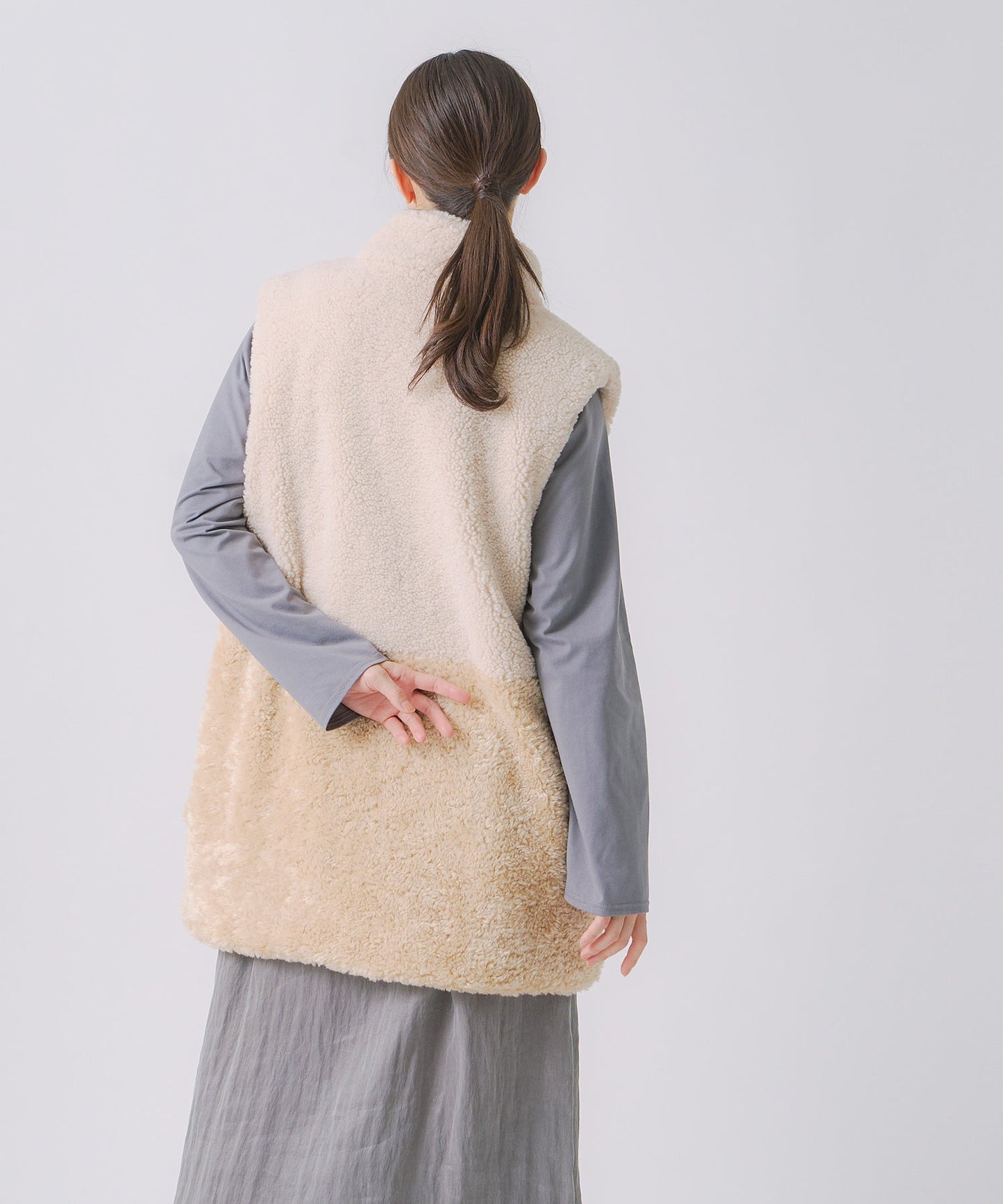 eco fur combination vest / WHT25FJK4045