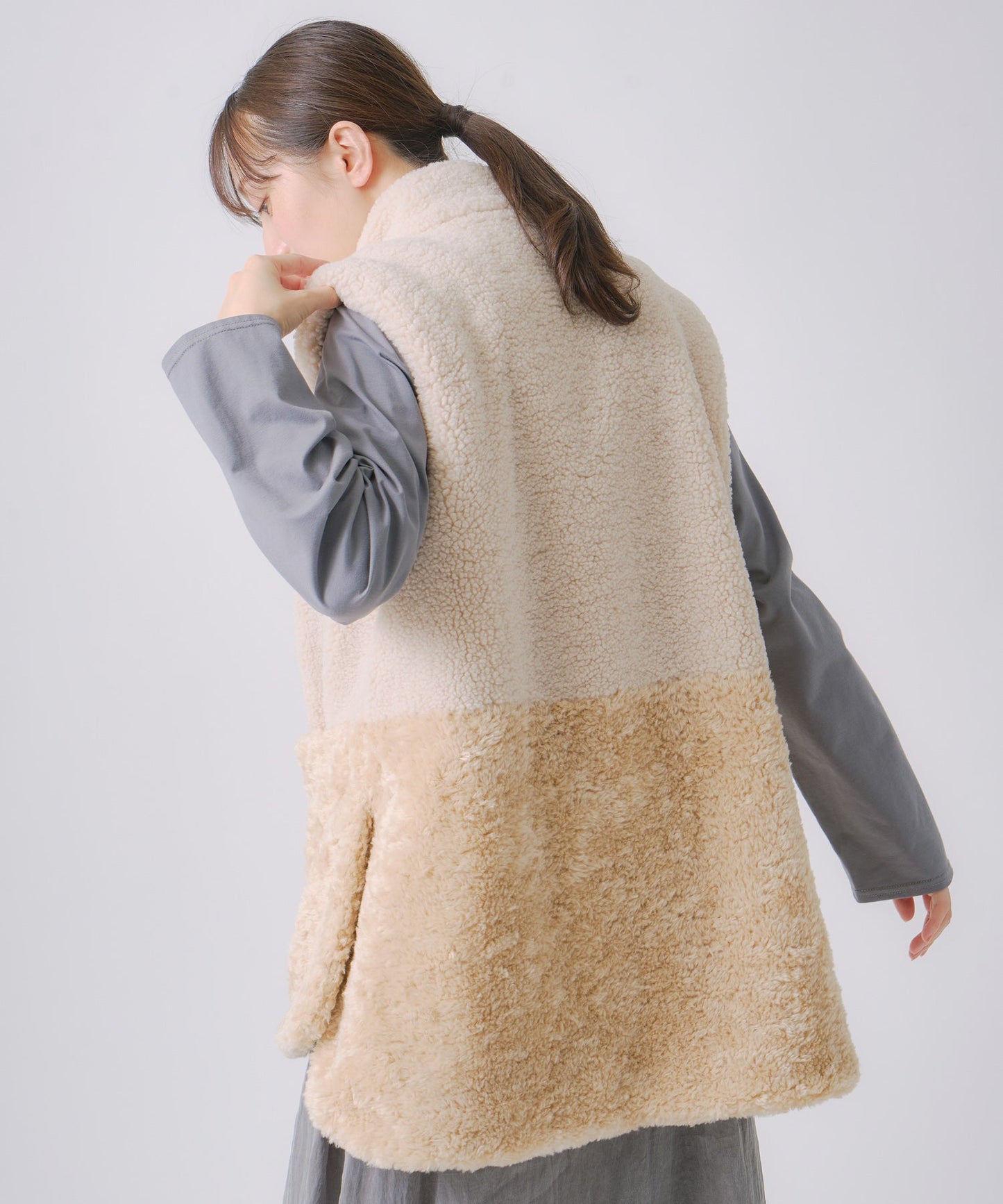 eco fur combination vest / WHT25FJK4045