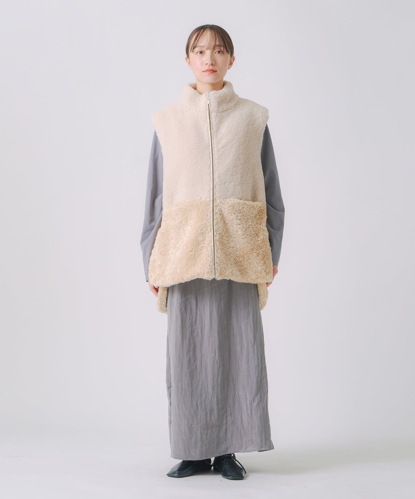 eco fur combination vest / WHT25FJK4045