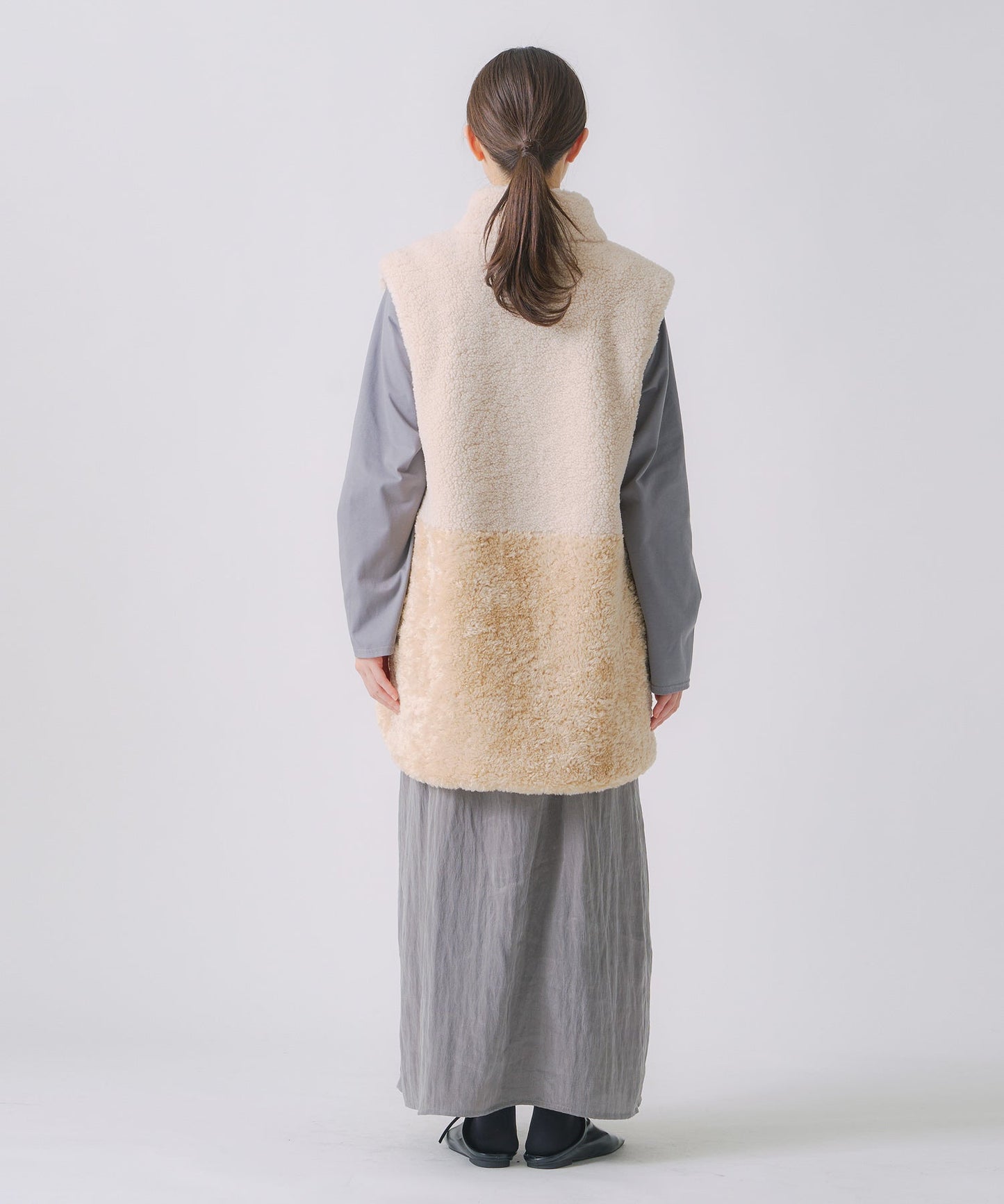 eco fur combination vest / WHT25FJK4045