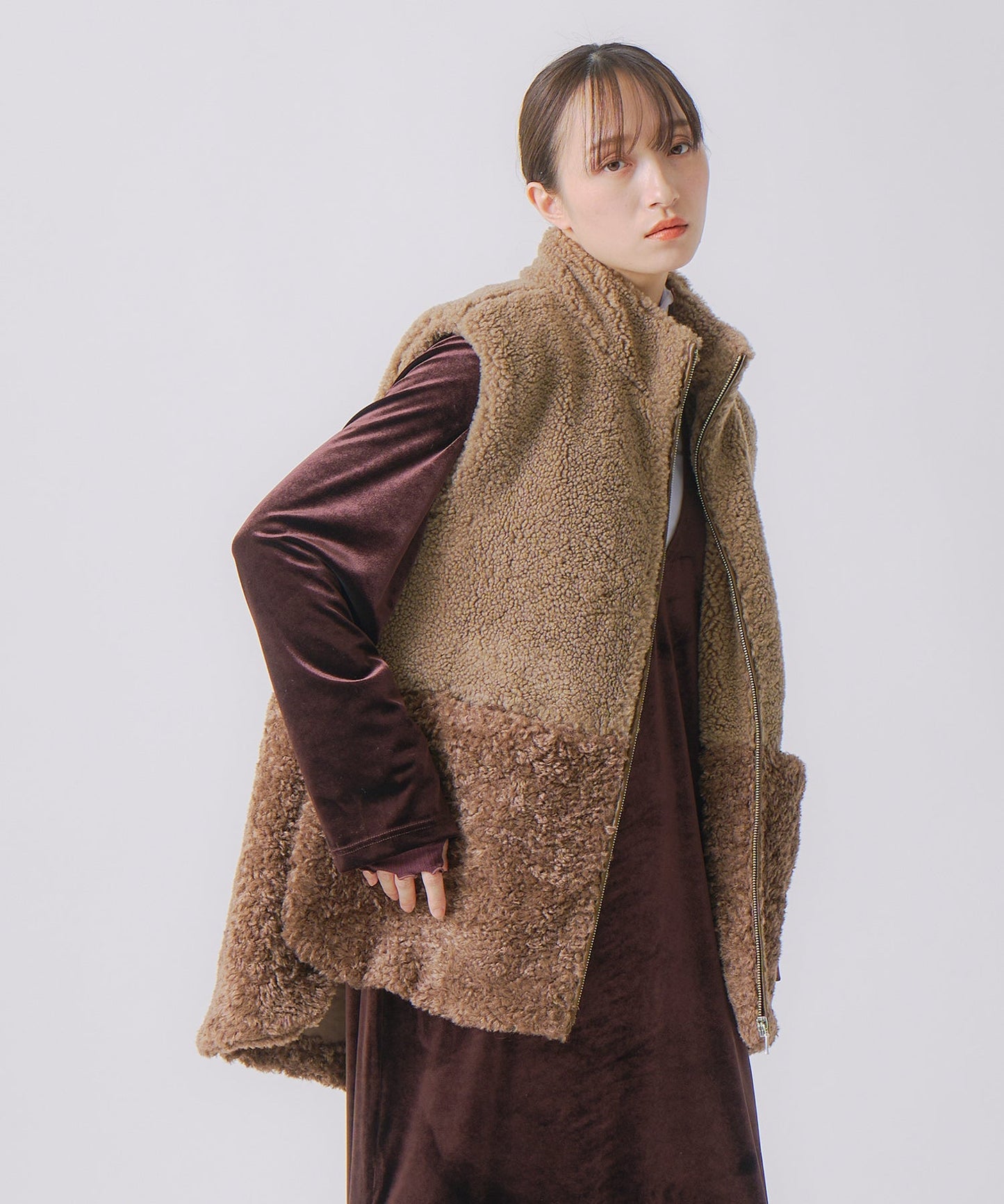 eco fur combination vest / WHT25FJK4045
