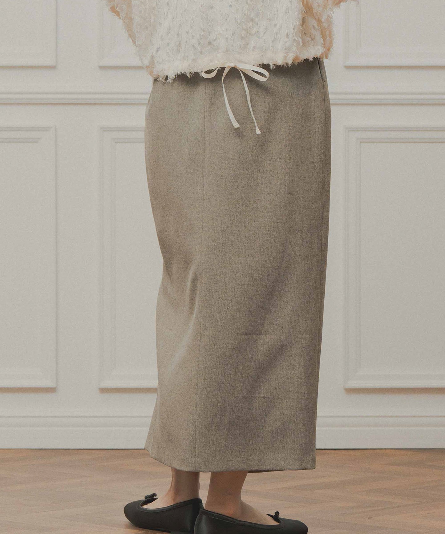 asymmetry tuck skirt / WHT26FSK4033